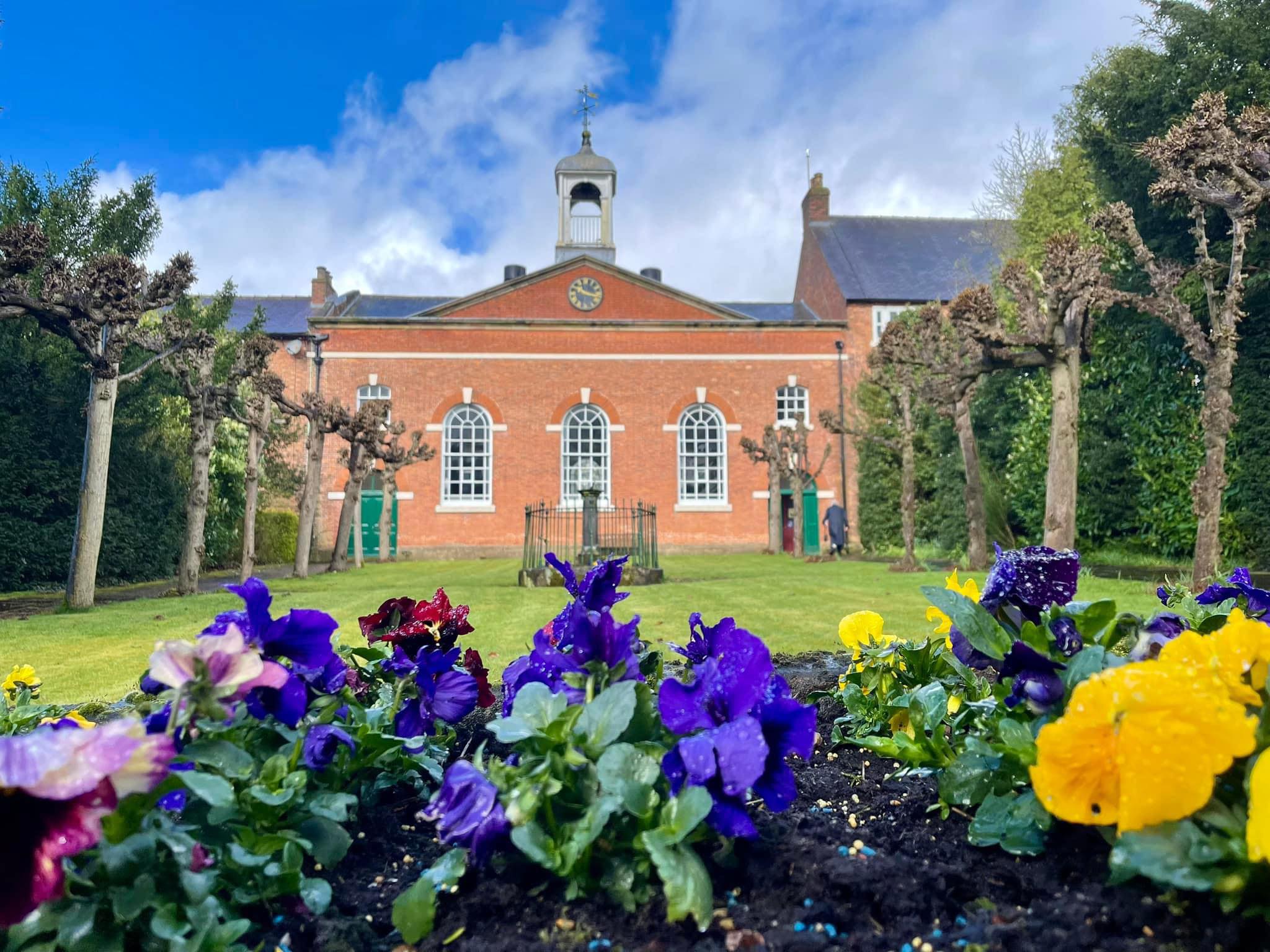 The red-brick chapel and white cupola at the Ockbrook Moravian Settlement
