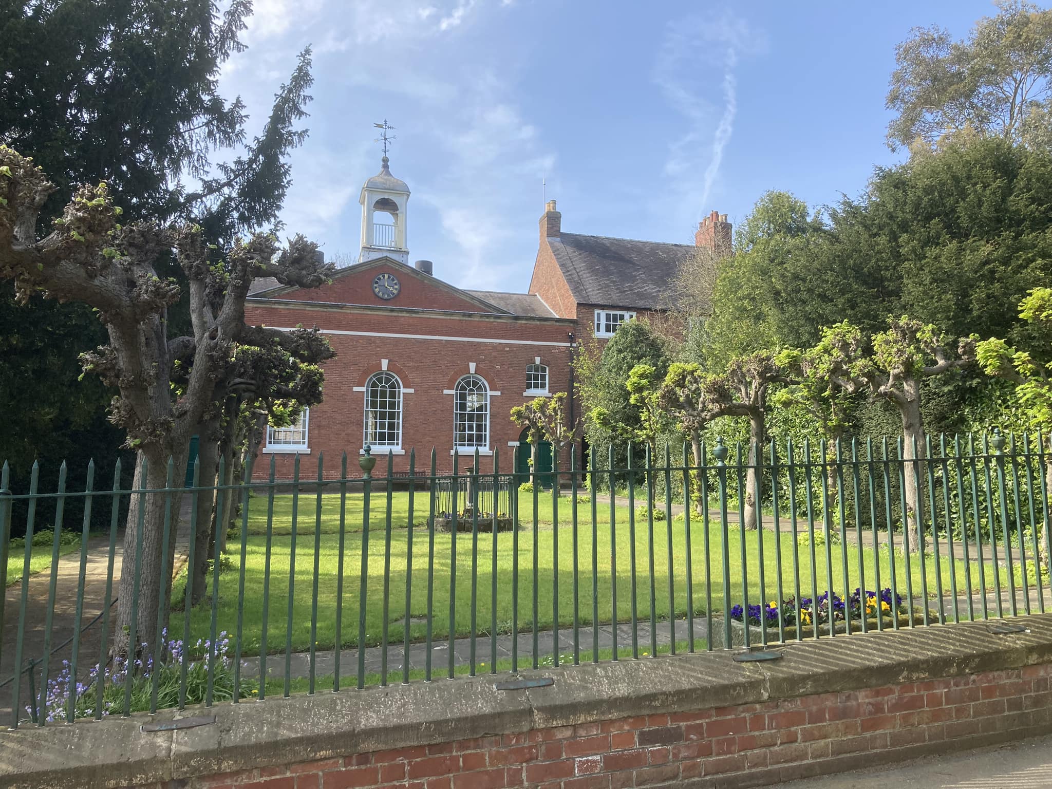 The red-brick chapel and white cupola at the Ockbrook Moravian Settlement